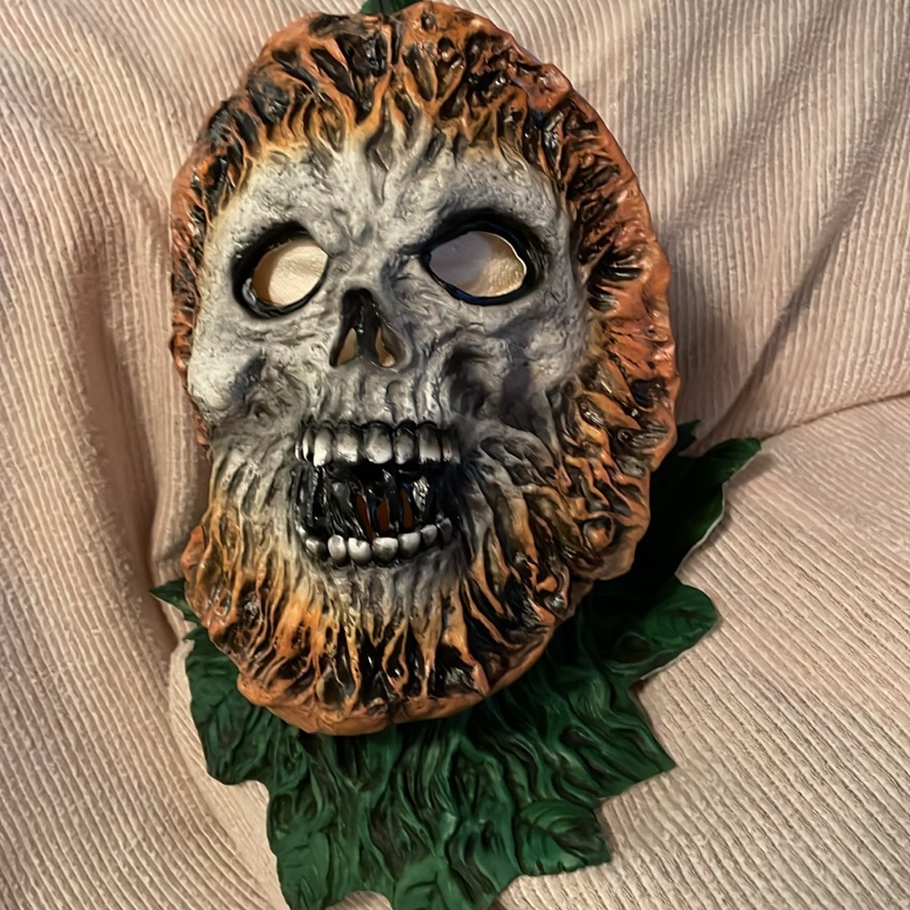 Scary Pumpkin Head mask. Full head cover and neck w slit in back to slip it on.